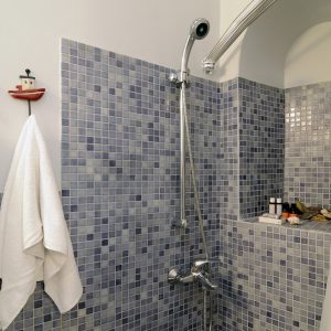 Archipel Main House_2nd Bedroom_en suite bathroom Ground Level_Aria Hotels, Fira - Santorini